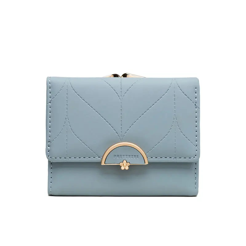 Paradise Divas' elegant three-fold wallet for women, designed with a compact size and multiple compartments 
